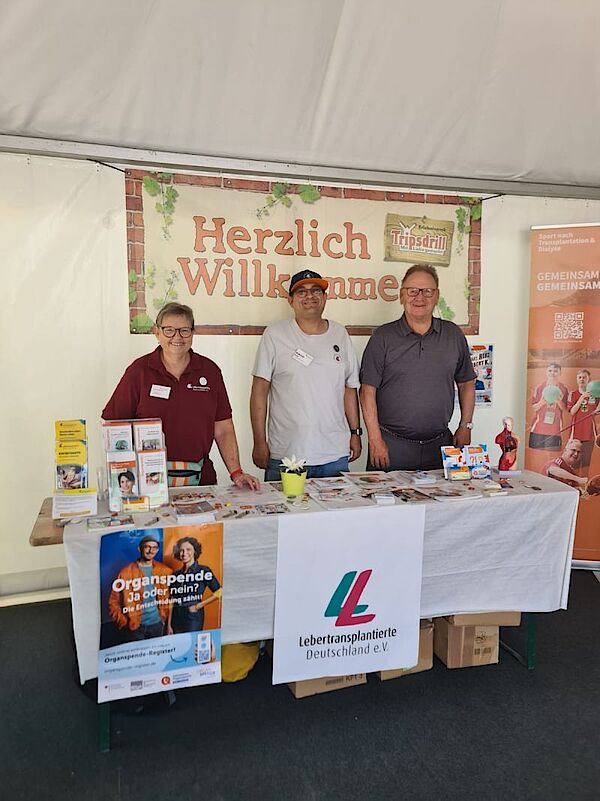 Andrea Sebastian, Andreas Müller und Peter Rode am Infostand